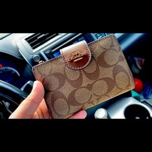 Real coach purse and wallet set.
